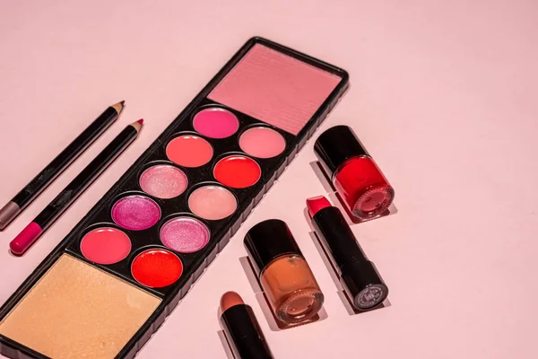 Makeup, lipstick and brushes ready to use