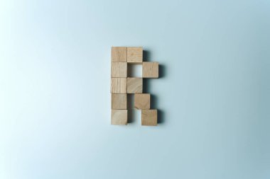 Letter R from wooden dice White Background