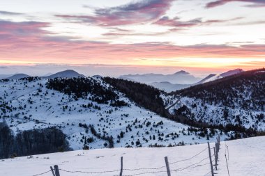 Sunrise in the mountains (winter cold morning sunlight, Coll d'Ares, Spain)