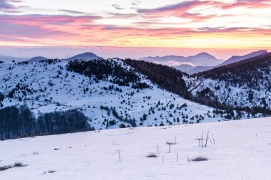Sunrise in the snow mountains