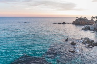Sunset on the coastline of the Mediterranean Sea (Costa Brava, Catalonia, Spain)