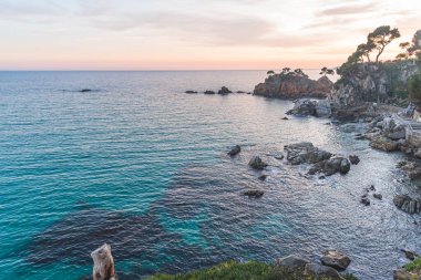 Sunset on the coastline of the Mediterranean Sea (Costa Brava, Catalonia, Spain)