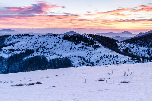 Cold winter sunrise in the mountain (Coll d'Ares, border between Spain and France, Catalan Pyrenees)