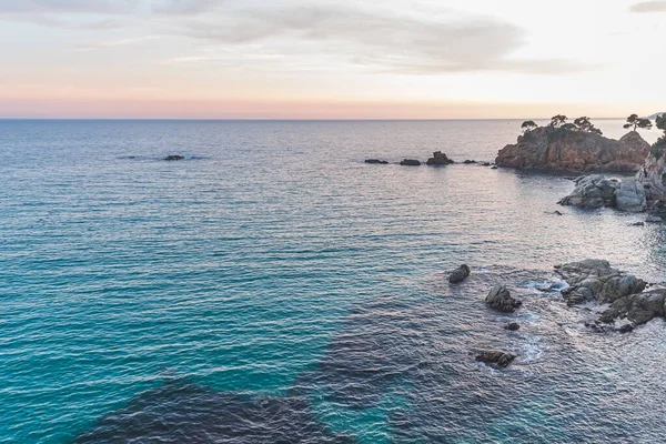 Sunset on the coastline of the Mediterranean Sea (Costa Brava, Catalonia, Spain)
