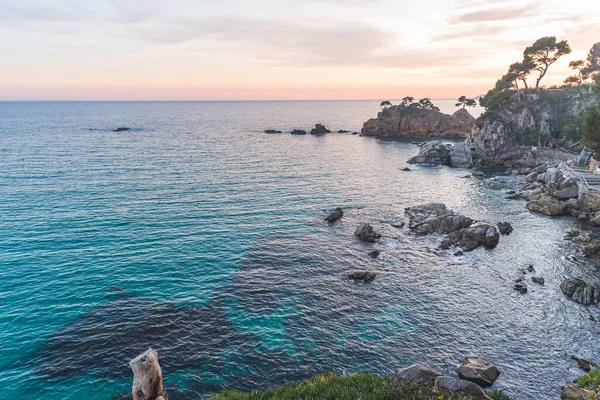Sunset on the coastline of the Mediterranean Sea (Costa Brava, Catalonia, Spain)