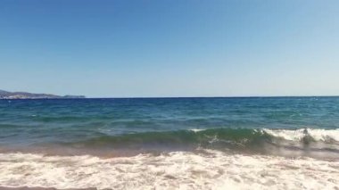 Beach and blue sky at the coastline of the sea