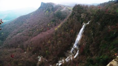 Amazing waterfall on a cloudy day (Salt de la Coromina, Garrotxa, Spain)