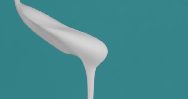 Close up of of fresh plain yogurt dripping down — Stock Video