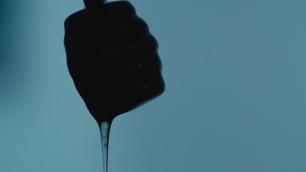 Close up of Dripping Spoon Of Honey — Stock Video