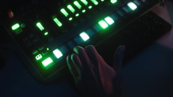 Close-up of music producer working on drum machine — Stock Video