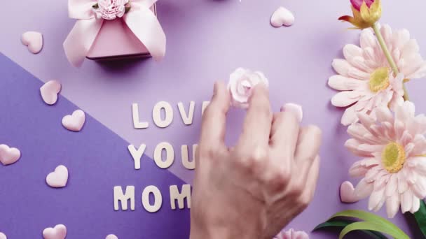 Love you mom purple background for mothers day — Vídeos de Stock