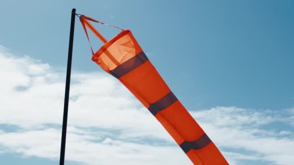 Windsock with blue sky on background — Wideo stockowe