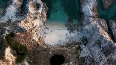 Aerial view of stunning cliff on the turquoise sea