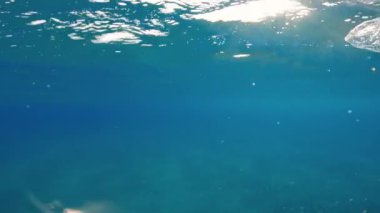 Close up of plastic waste floating in the ocean