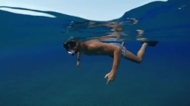 Diving Underwater With Long Fins.