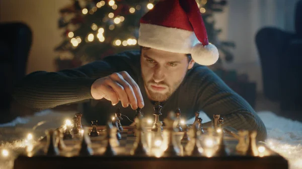 Boy Plays Chess on Christmas Mood.