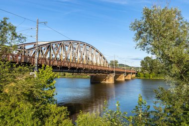 Old steel railway bridge over the river Vah, in Puchov, Slovakia.