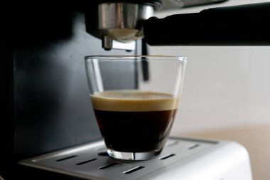 Coffee machine preparing a cup of coffee