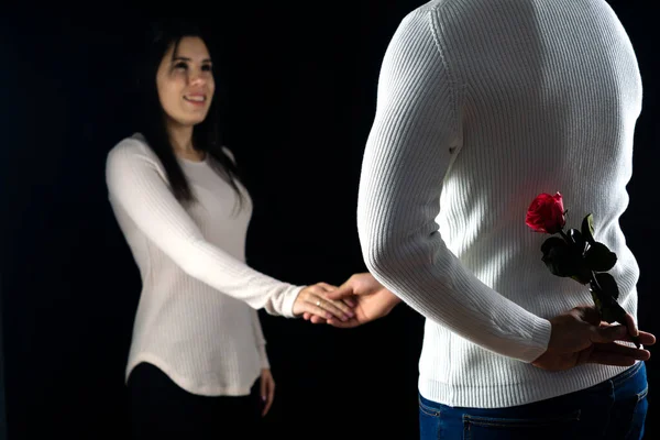 Unrecognizable Man Hiding Rose While Holding His Wife Hand Giving — Stok fotoğraf
