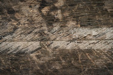 Ahşap doku arka planı. Çatallı eski ahşap masa manzarası. Açık kahverengi ahşap yüzey, doğal rengi, dokusu ve deseni var. Arkaplan için kaba kereste.