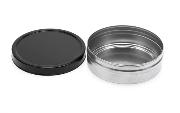 Open tin can with black lid isolated on a white background.