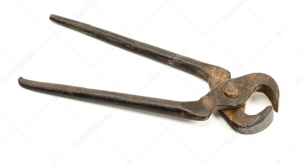 old used iron cutting pliers tongs or nippers on white background tool isolated
