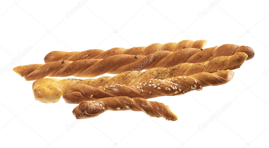 Sesame grissini : sesame breadsticks isolated on white background