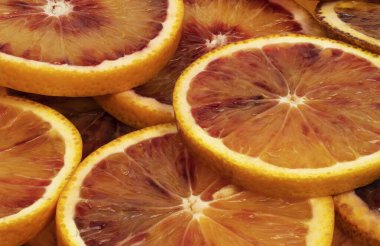 Turunçgil dilimlerinin soyut arkaplanı. Yakın plan. Stüdyo fotoğrafçılık.