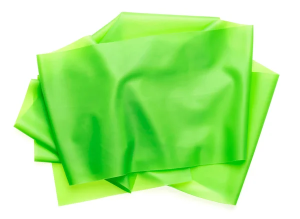 白色背景上的一块绿色橡胶 — 图库照片