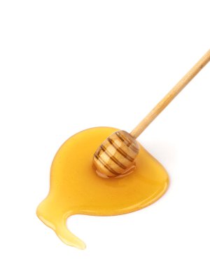 Tatlım sopa ile akan tatlım izole üzerinde beyaz arka plan