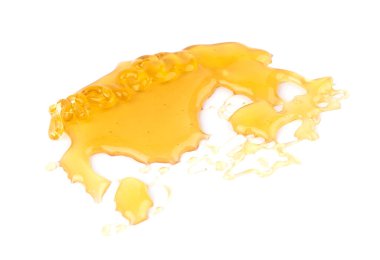 Tatlım bırak izole üzerinde beyaz arka plan. Tatlı bal girdap, closeup dökme