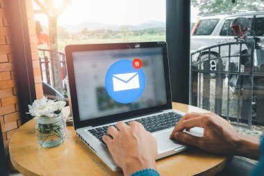 Email marketing concept, Business person receiving new incoming message at work, e-mail communication marketing, business newsletter.	