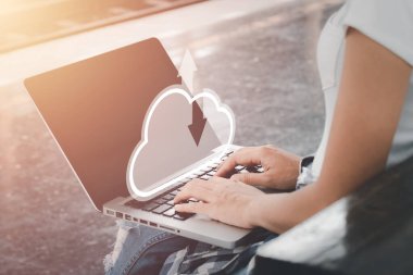 Woman hand using laptop computer with cloud computing icon, Cloud computing concept, Backup Storage Data Internet, networking and digital, Share global, technology concept...	