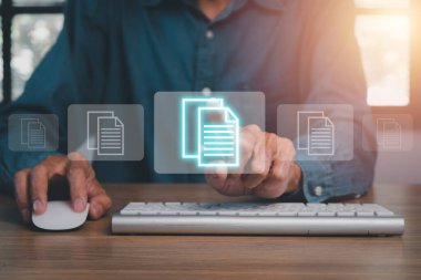 Businessman hand using computer with document management icon, Document management data system business internet technology concept..	