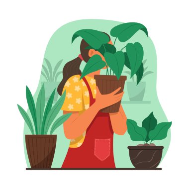 Woman Taking Care of Tree in Garden