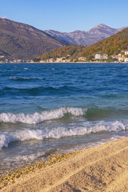 Beautiful winter Mediterranean landscape on sunny day. Montenegro, Adriatic Sea, view of Bay of Kotor Bay near Tivat city