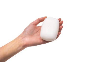 İzole edilmiş sabun çubuğuyla el beyaz arkaplan