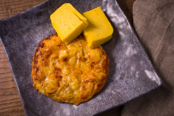 Frico tipik Friulian yemeği. Patates ve peynire dayanıyor, İtalya.