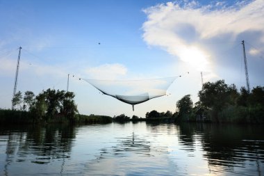 fishing hut with suspension net in the natural reserve of the Marano lagoon. Friuli