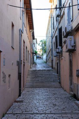 Pula Croatia. July 30, 2022 alley with staircase in the historic center of the city