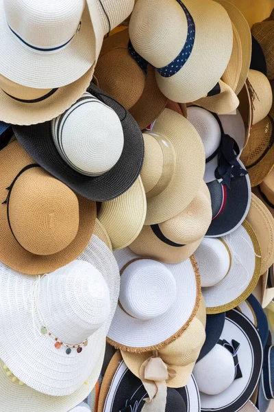 straw hats in the market stall