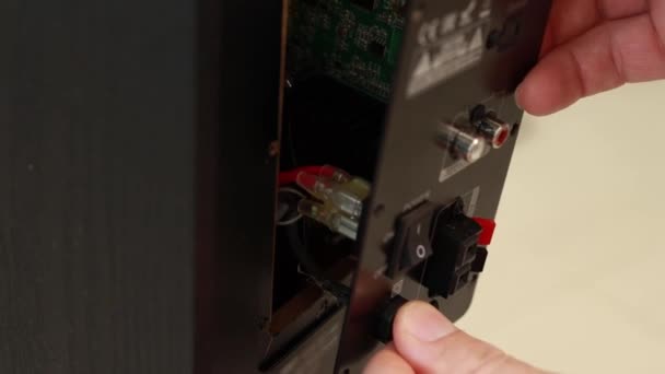 Close-up of a man repairing an instrument chip at home Slow motion — Stock Video