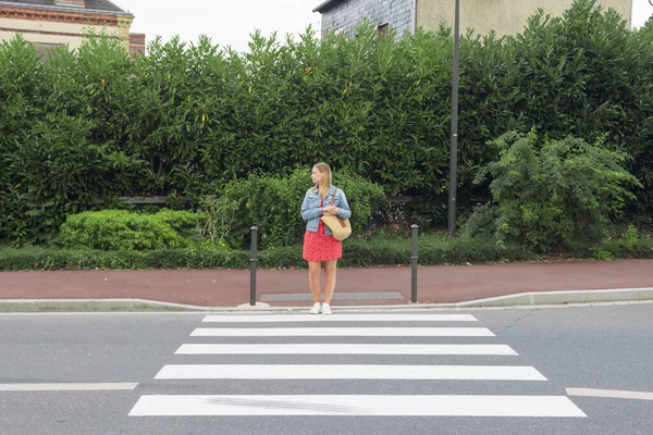 Girl Red Dress Denim Jacket Stands Pedestrian Crossing Pedestrian Crossing — Stockfoto