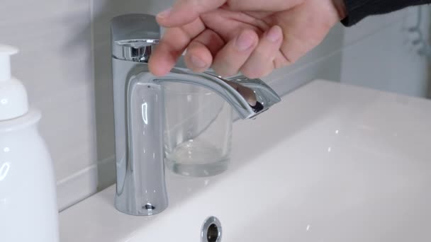 Mans Hand Isolated Light Background Turns Water White Washbasin Man — 图库视频影像