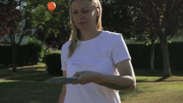 Girl European Appearance Blond Hair White Shirt Plays Ping Pong — Stockvideo