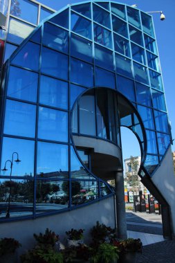 5.08.2022 Augustow Poland.Modern building and mirror image.