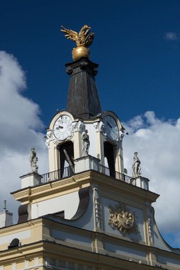 6.09.2022 Bialystok Poland.View of the historic clock under the golden eagle.