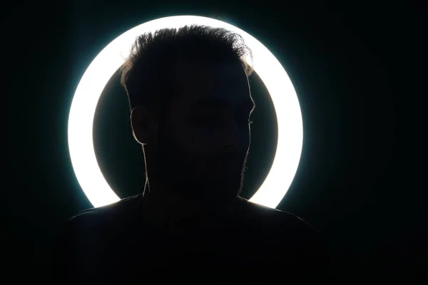 Face of a young boy with ring light