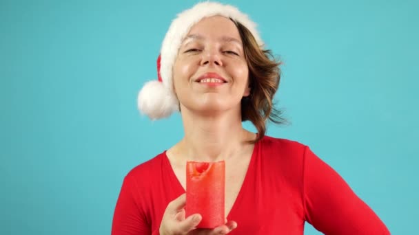 Forty Year Old Woman Red Sweater New Year Hat Holds — Vídeo de Stock