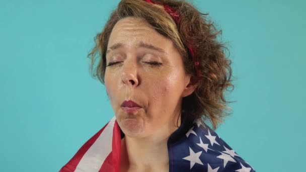 Adult Pin Woman Eats Blue Background Slow Motion Portrait — Stok video